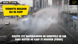 Verhitte beelden: Politie zet waterkanon en knuppels in om fans buiten De Kuip te houden