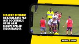 Bizar! Braziliaanse fan met dochtertje op de arm schopt speler tegenstander (VIDEO)